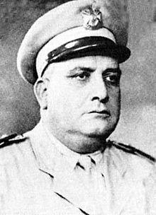 A person in a military uniform
Description automatically generated