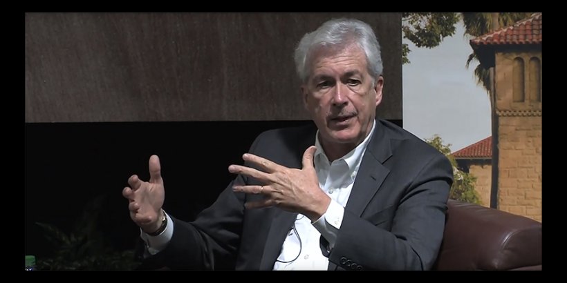 A person in a suit

AI-generated content may be incorrect.