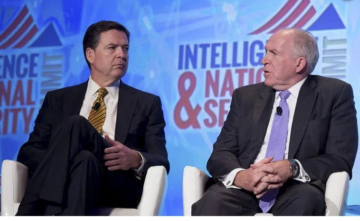 A person in a suit and tie sitting in chairs

AI-generated content may be incorrect.