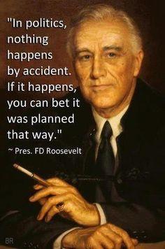 A person in a suit holding a cigarette

AI-generated content may be incorrect.