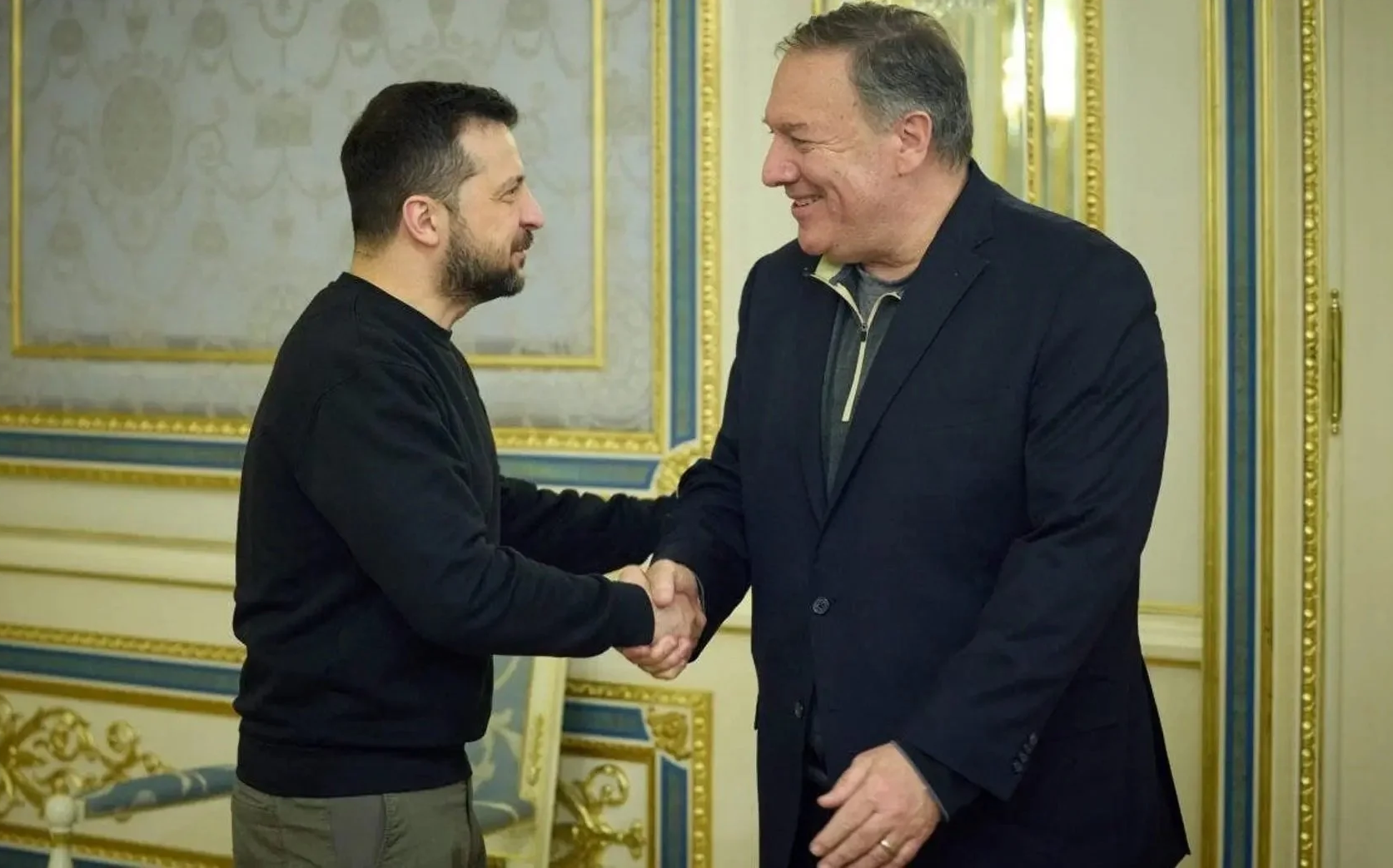 A person shaking hands with another person

AI-generated content may be incorrect.