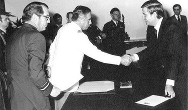 Miguel Kast (right) greeting dictator Augusto Pinochet during his rule in the 1970s. (Facebook: Unión Nacionalista Austral)