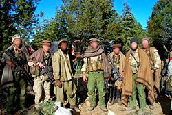 A group of men in military uniforms
AI-generated content may be incorrect.