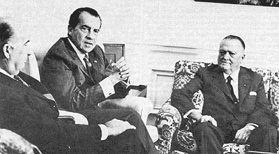 A group of men sitting in chairs

AI-generated content may be incorrect.