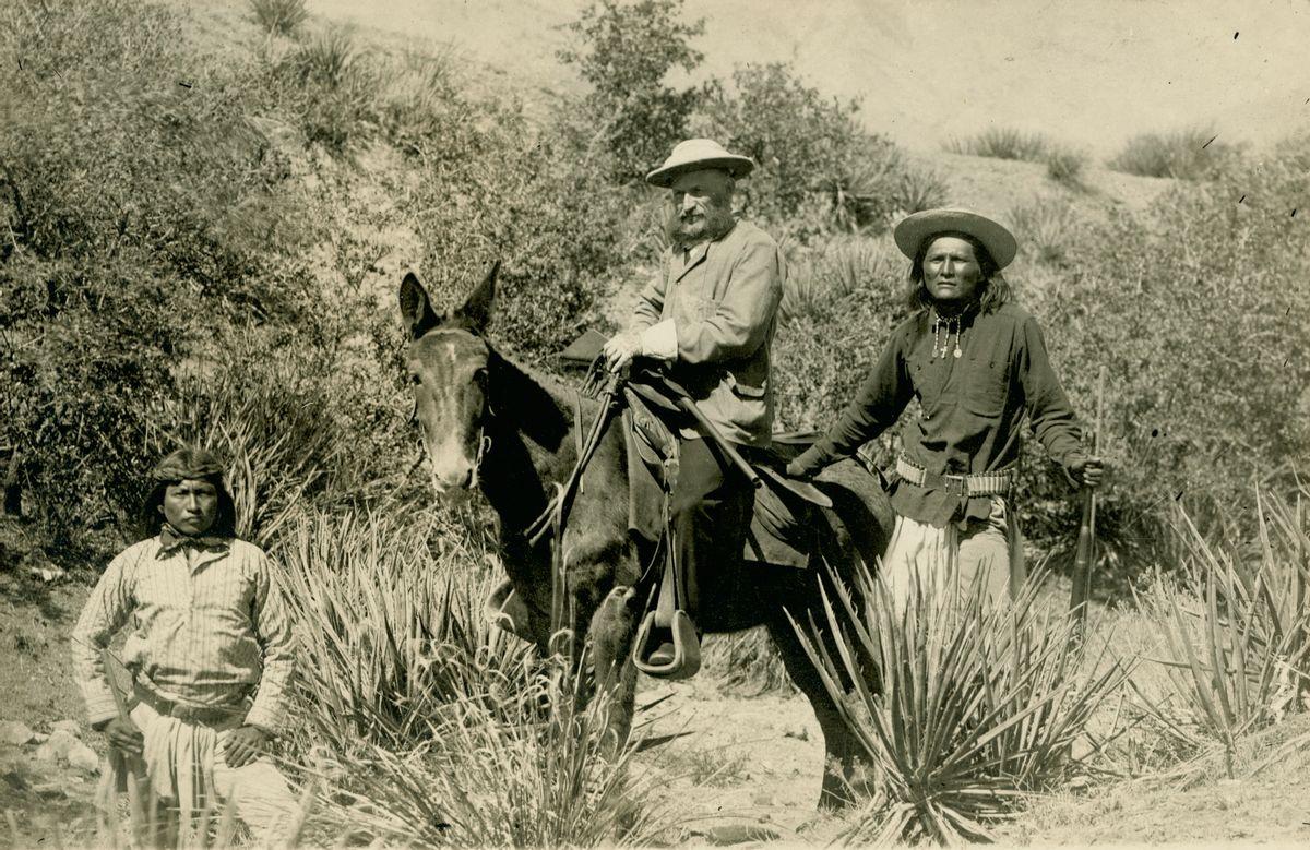 A group of people sitting on a donkey

AI-generated content may be incorrect.