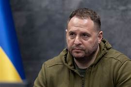 A person in a green jacket

AI-generated content may be incorrect.