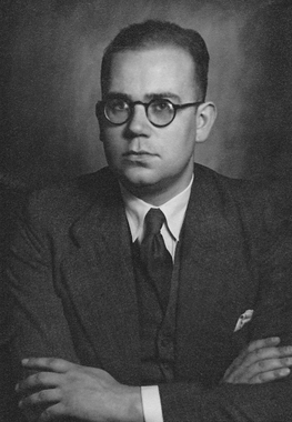 A person in a suit and tie

AI-generated content may be incorrect.