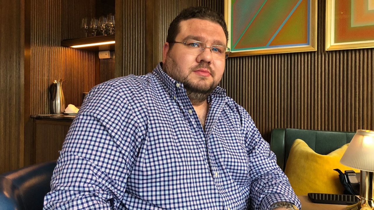 A person sitting in a chair

AI-generated content may be incorrect.