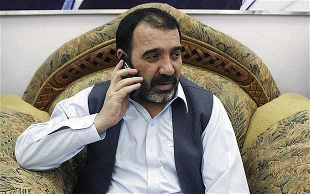 A person sitting in a chair talking on a cell phone
AI-generated content may be incorrect.