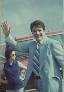 A person waving in front of a bus

AI-generated content may be incorrect.