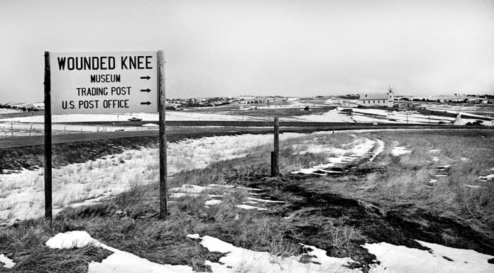 A sign on a road Description automatically generated