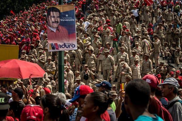 Government workers at a rally for President Nicolás Maduro in Caracas, Venezuela’s capital.