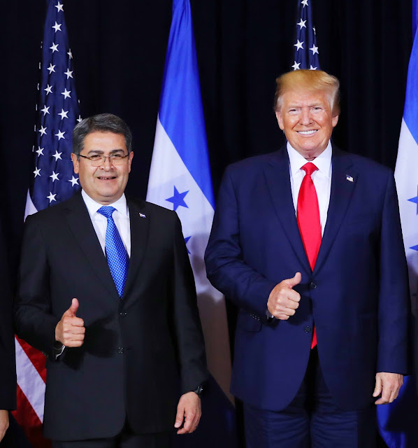 Two men in suits and ties

AI-generated content may be incorrect.