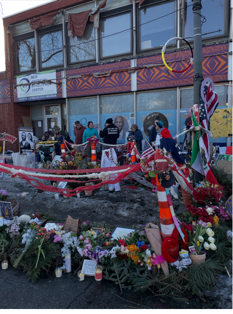 A group of people outside a building
AI-generated content may be incorrect.