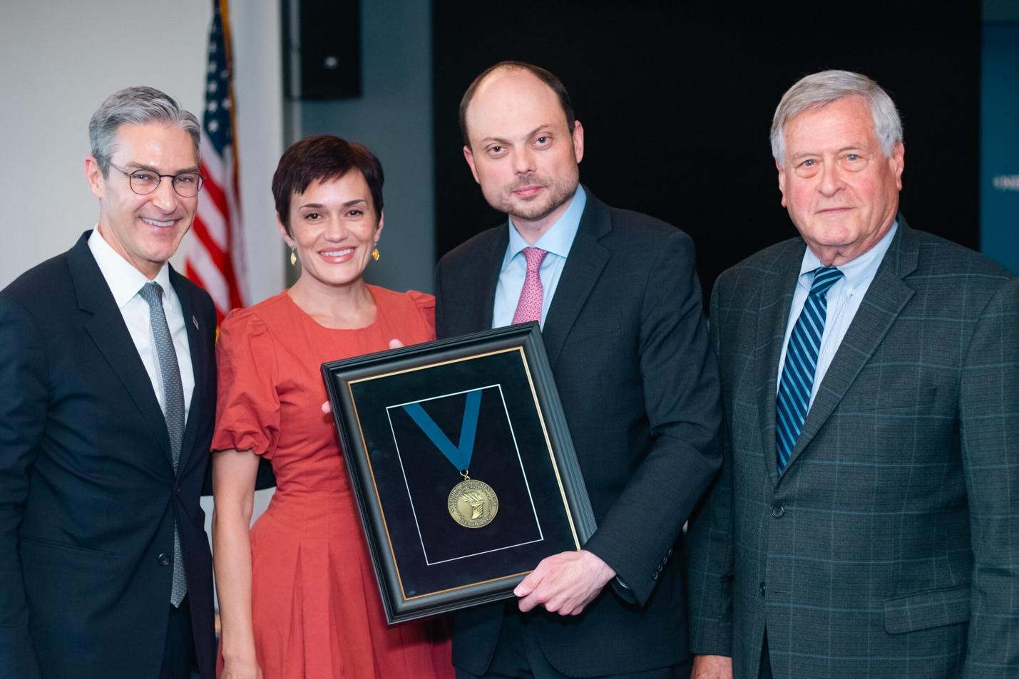 A group of people posing for a photo
AI-generated content may be incorrect.