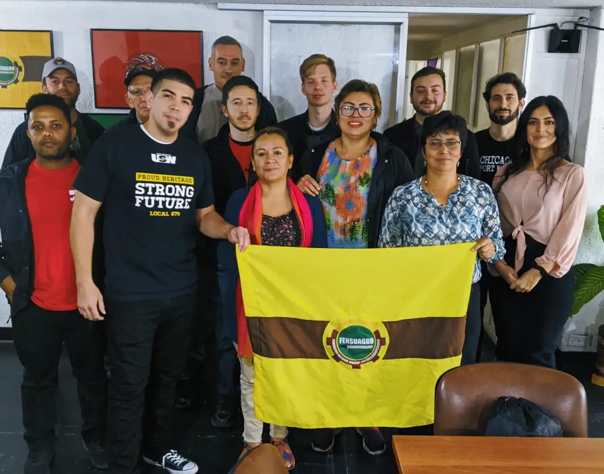 A group of people posing for a photo

AI-generated content may be incorrect.