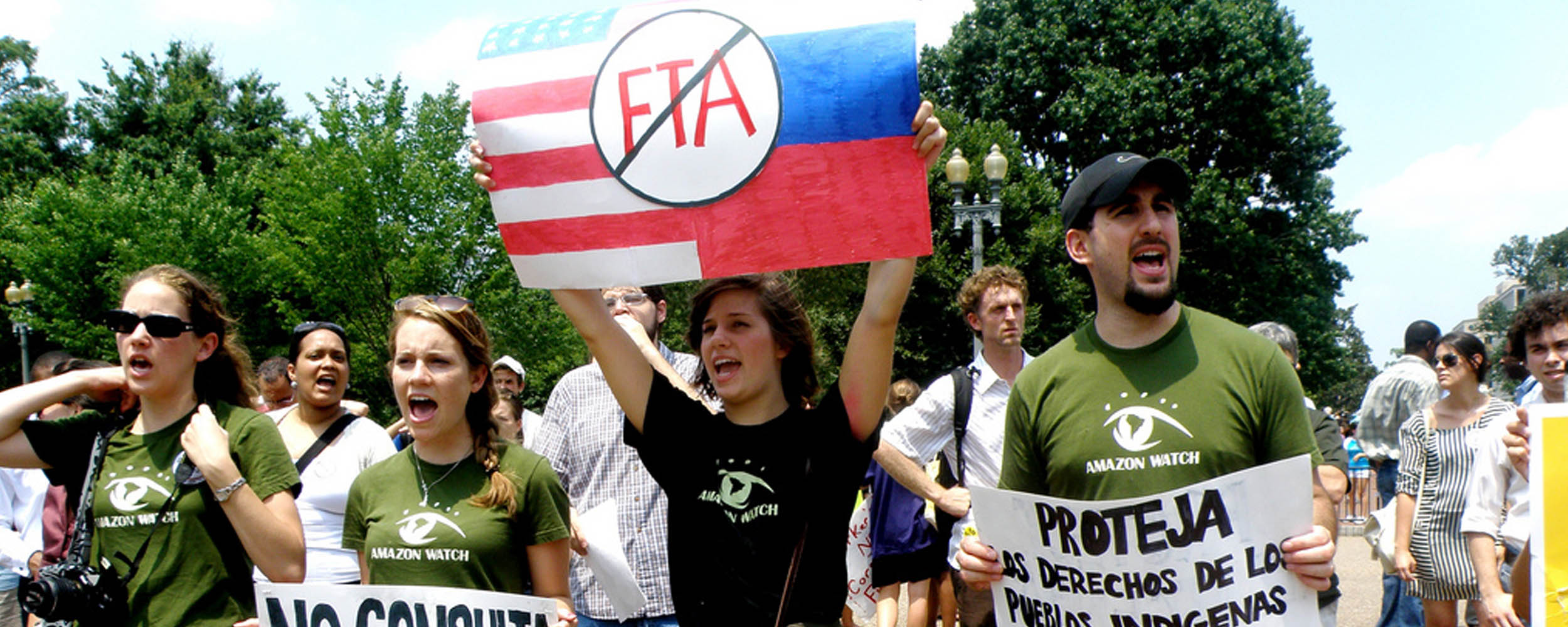 A group of people protesting

AI-generated content may be incorrect.