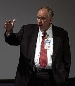 A person in a suit and tie
AI-generated content may be incorrect.