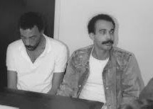 A person sitting next to another person
AI-generated content may be incorrect.