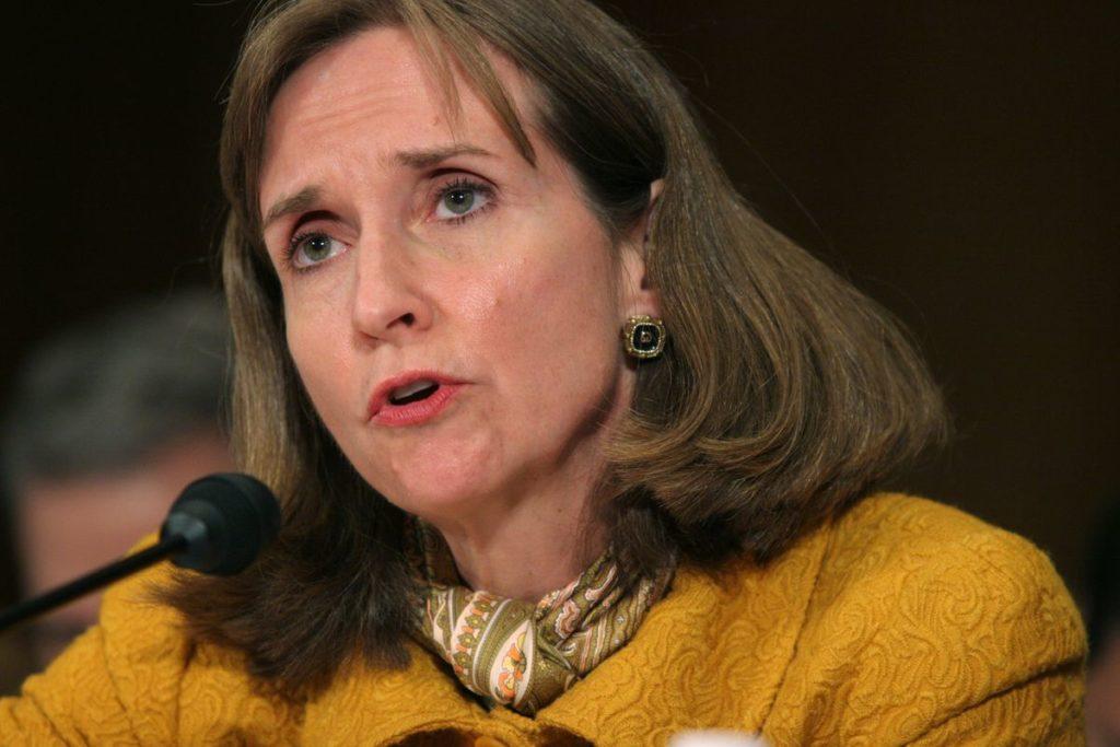 A person speaking into a microphone
AI-generated content may be incorrect.