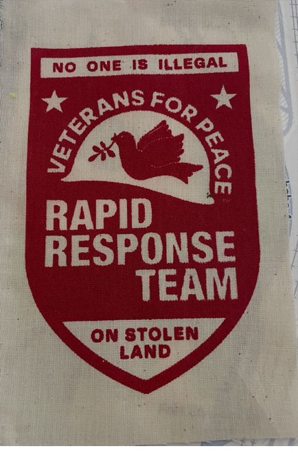 A red and white flag with a dove and a branch
AI-generated content may be incorrect.