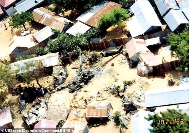 Wreckage: An aerial view of the Black Hawk 'Super 64' crash taken by US Special Forces Command shows the wreckage where the two Delta snipers died trying to save the lives of the crew