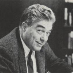 A person in a suit and tie

AI-generated content may be incorrect.