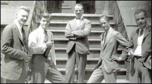 A group of men posing for a picture

Description automatically generated