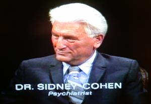 A person in a suit

AI-generated content may be incorrect.