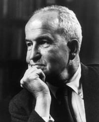 A person in a suit and tie

AI-generated content may be incorrect.