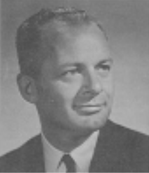 A person in a suit and tie

Description automatically generated