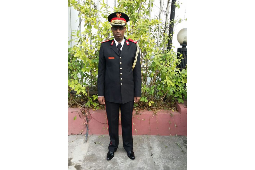 A person in a uniform

AI-generated content may be incorrect.