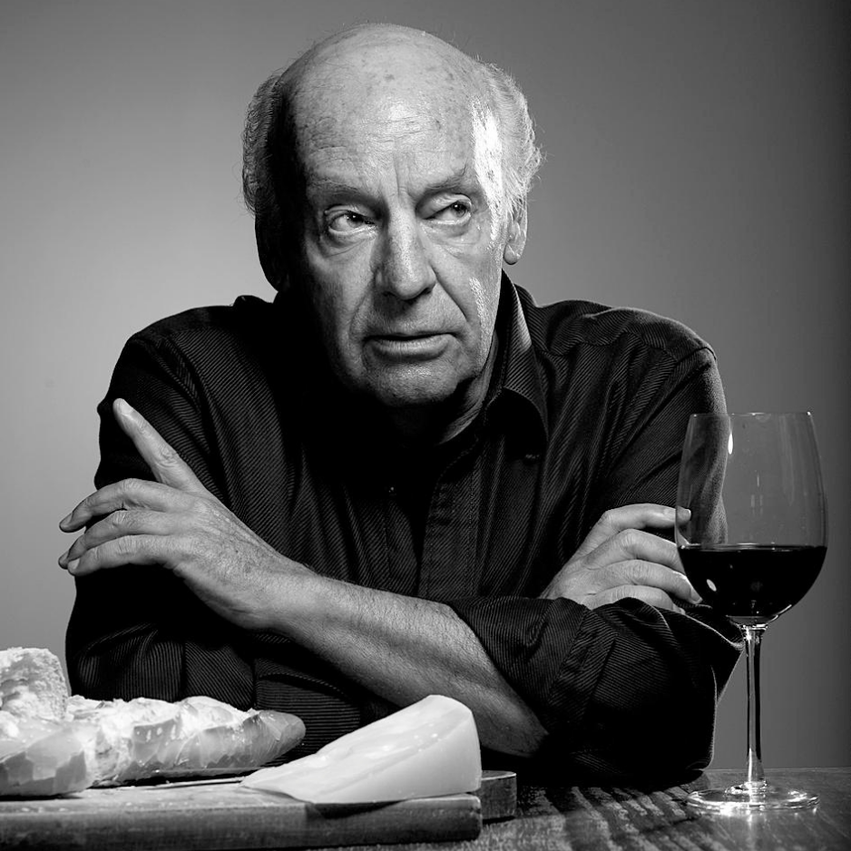 A person sitting at a table with a glass of wine

AI-generated content may be incorrect.