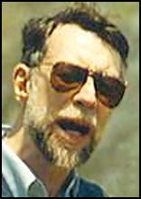 A person with a beard and sunglasses

AI-generated content may be incorrect.