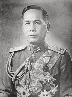 A person in military uniform with medals

AI-generated content may be incorrect.