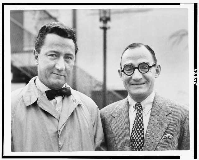 A couple of men wearing glasses

AI-generated content may be incorrect.
