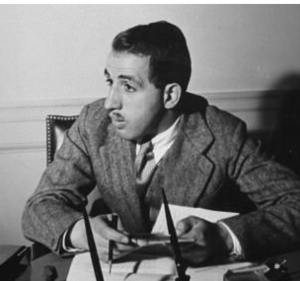 A person sitting at a desk

AI-generated content may be incorrect.