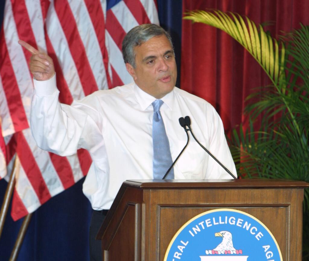 A person standing at a podium pointing at something

AI-generated content may be incorrect.