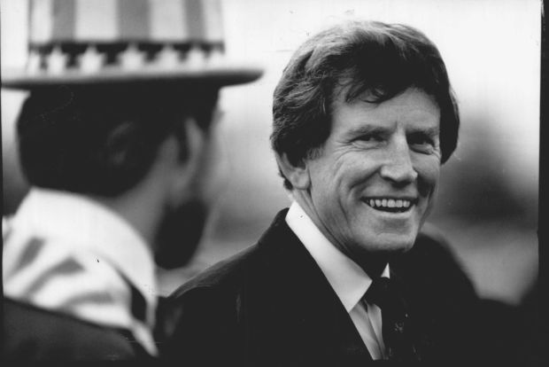 Gary Hart smiles at Uncle Sam