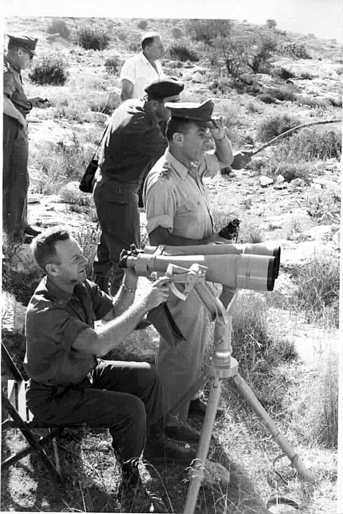 Men looking through a telescope
AI-generated content may be incorrect.