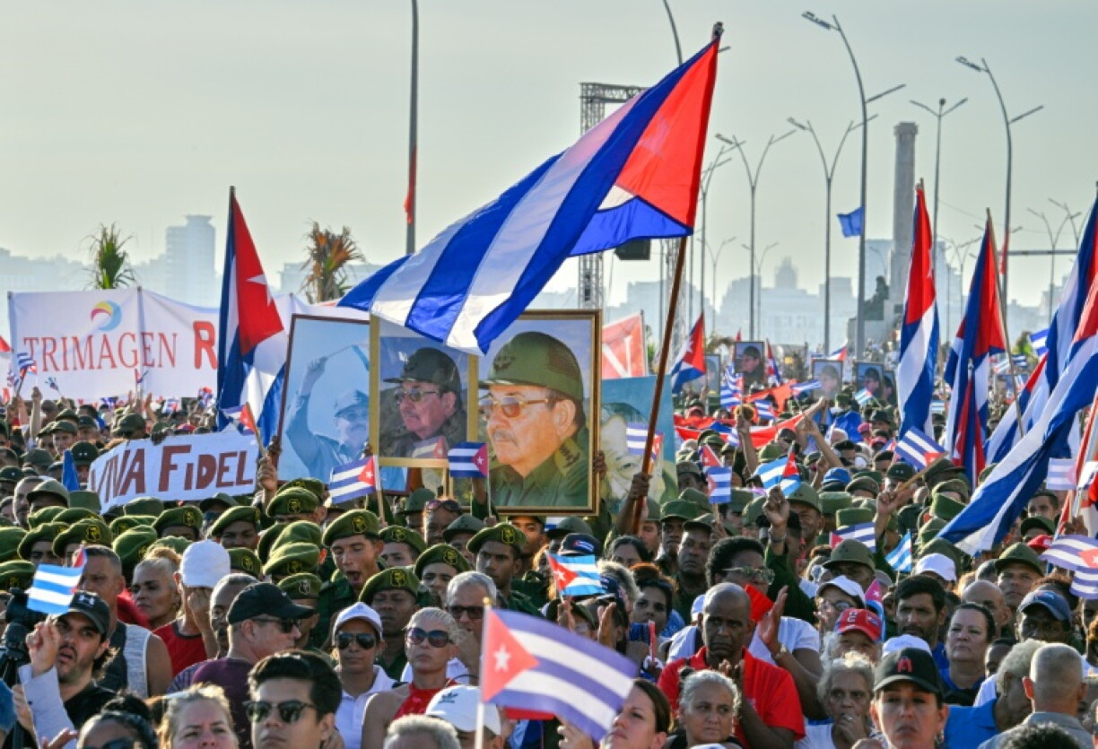 People attend a rally in support of former Cuban president Raul Castro, 94, who has been indicted by a US court, outside the US Embassy in Havana