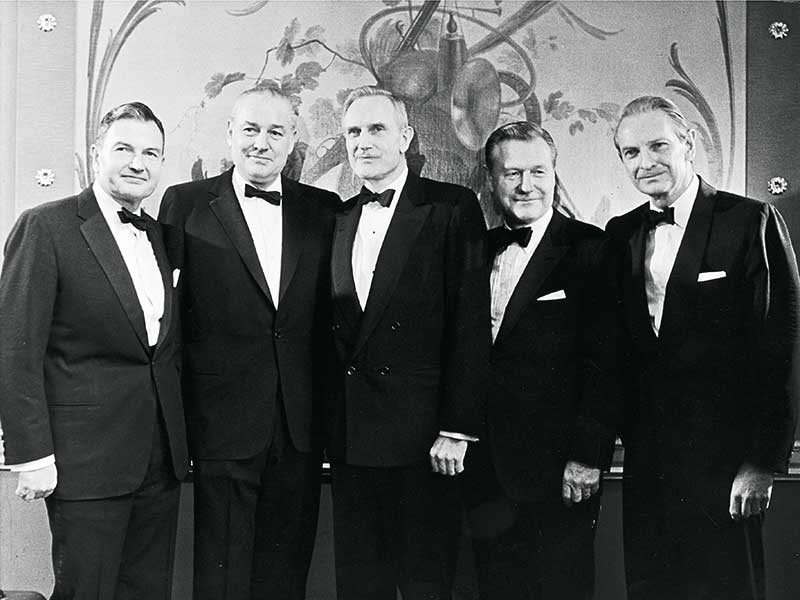 A group of men in suits

Description automatically generated