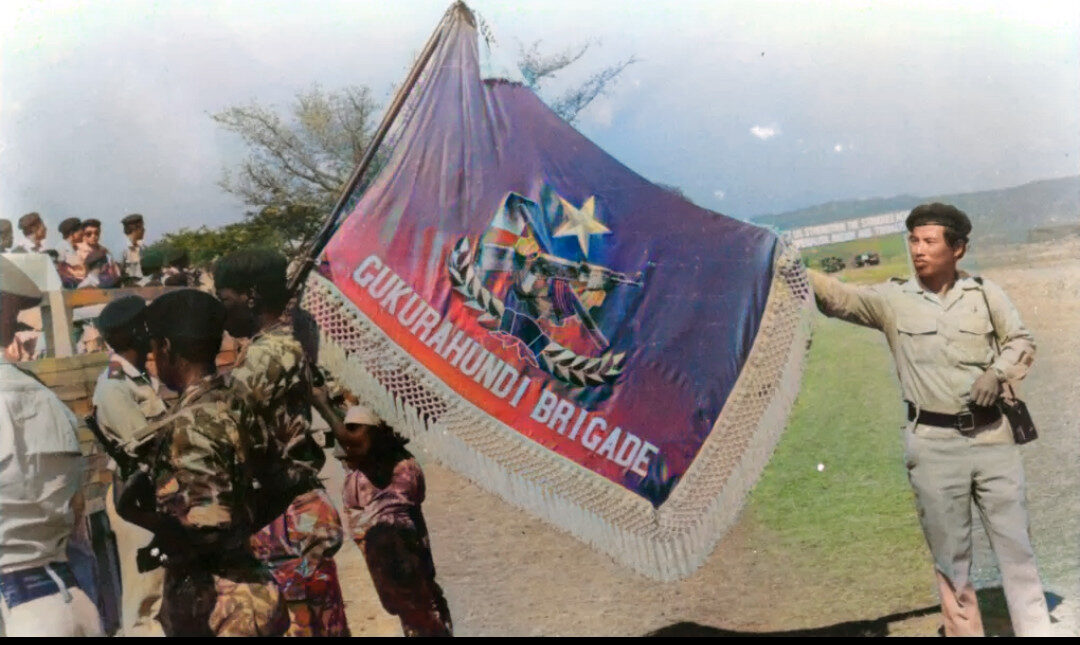 A group of people holding a flag
AI-generated content may be incorrect.
