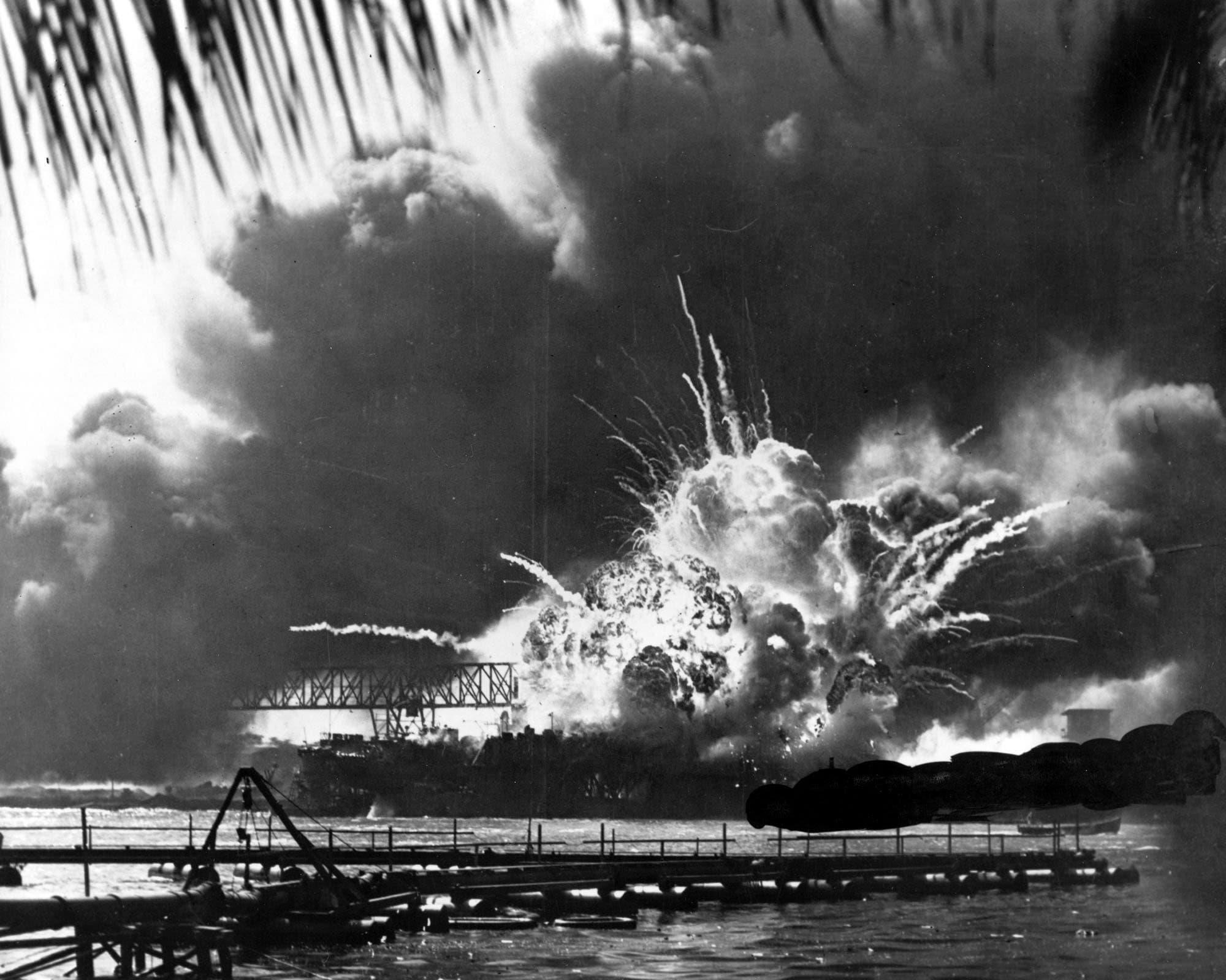 A large explosion in the water with Pearl Harbor in the background

AI-generated content may be incorrect.