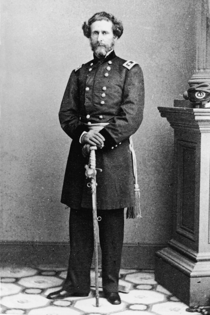 A person in military uniform holding a sword

AI-generated content may be incorrect.