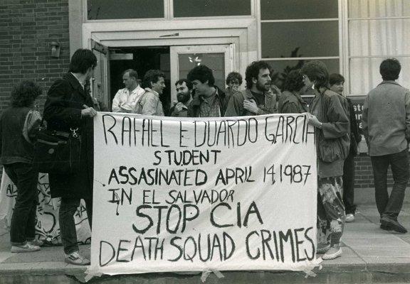 A group of people holding a banner
AI-generated content may be incorrect.