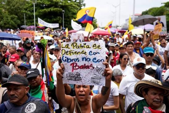 FMTWorld Protesters in Colombia's third-largest city Cali burned American  flags and clashed with riot police after a Trump-endorsed hard-right  candidate won the presidential election by a razor-thin margin. Police used  tear gas