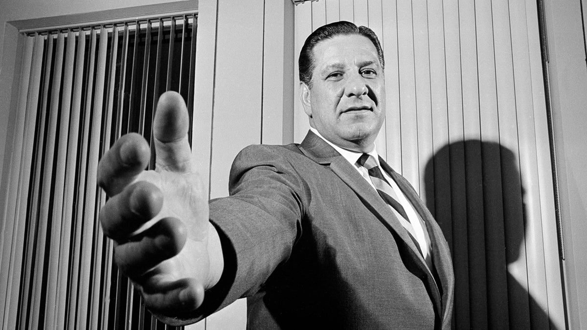  In 1968, Philadelphia Police Commissioner Frank Rizzo, then 47. extends a hand at his office in police headquarter. (Bill Achatz/AP Photo) 