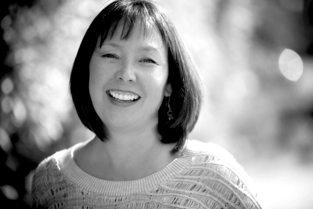 Medium shot of a person smiling
AI-generated content may be incorrect.