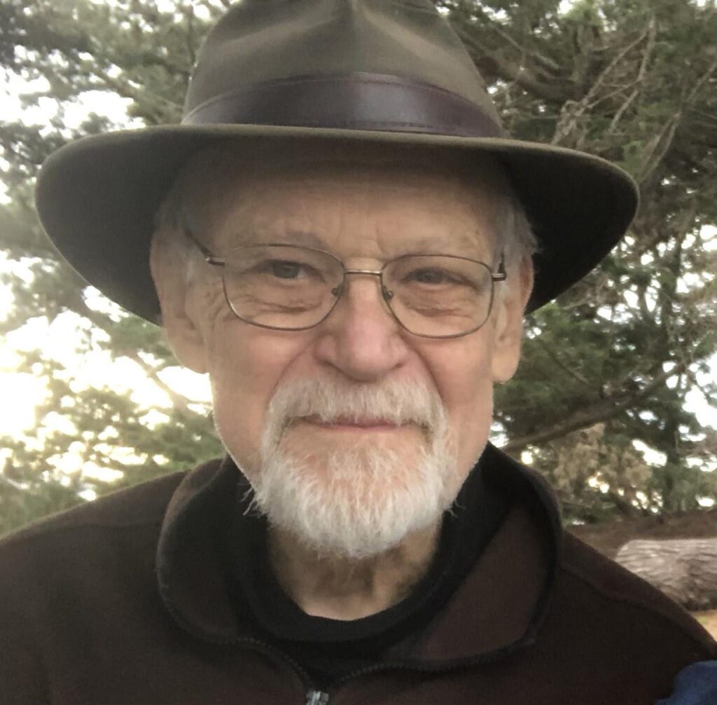 A person with a hat and glasses

AI-generated content may be incorrect.